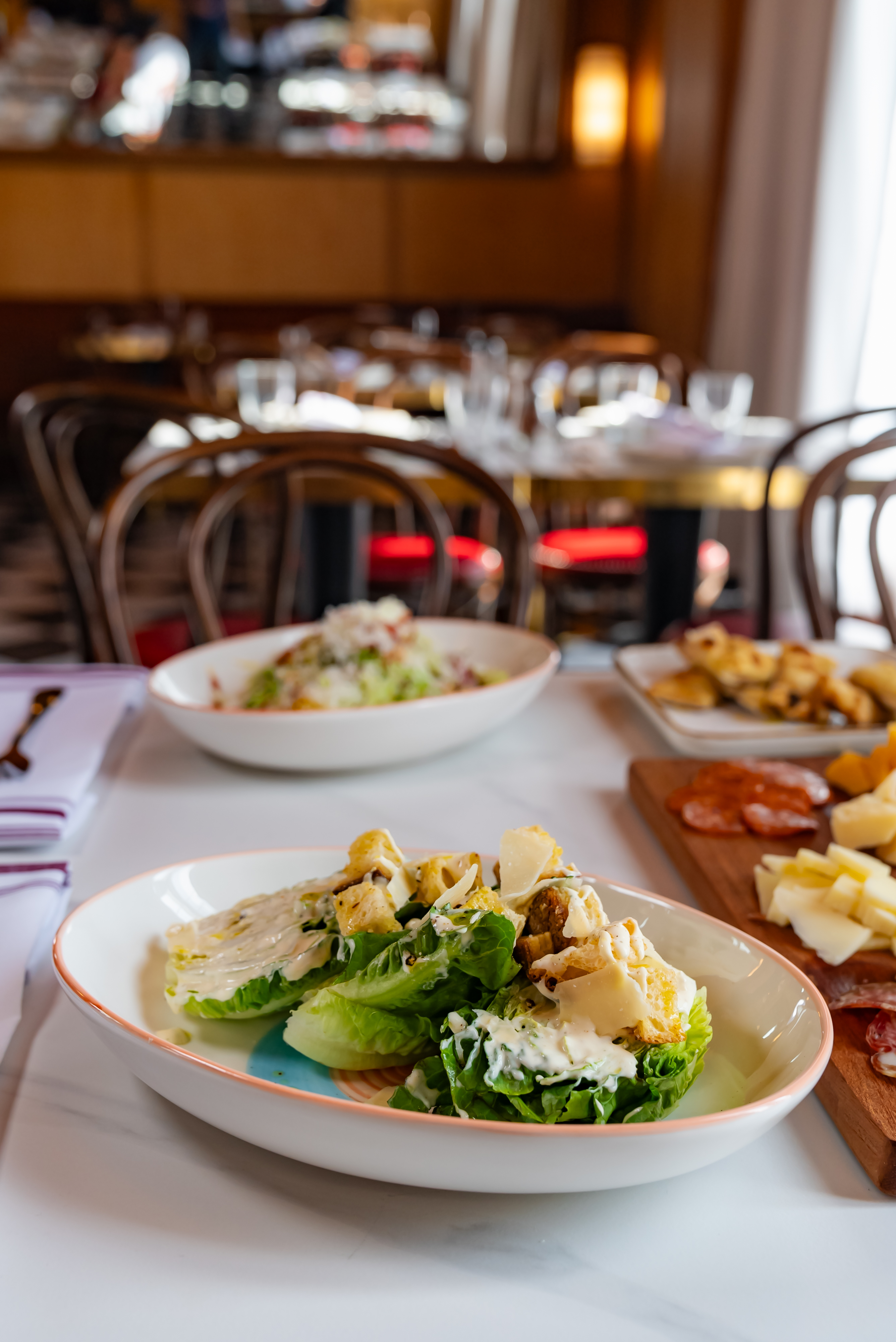 a table topped with plates of food on a plate