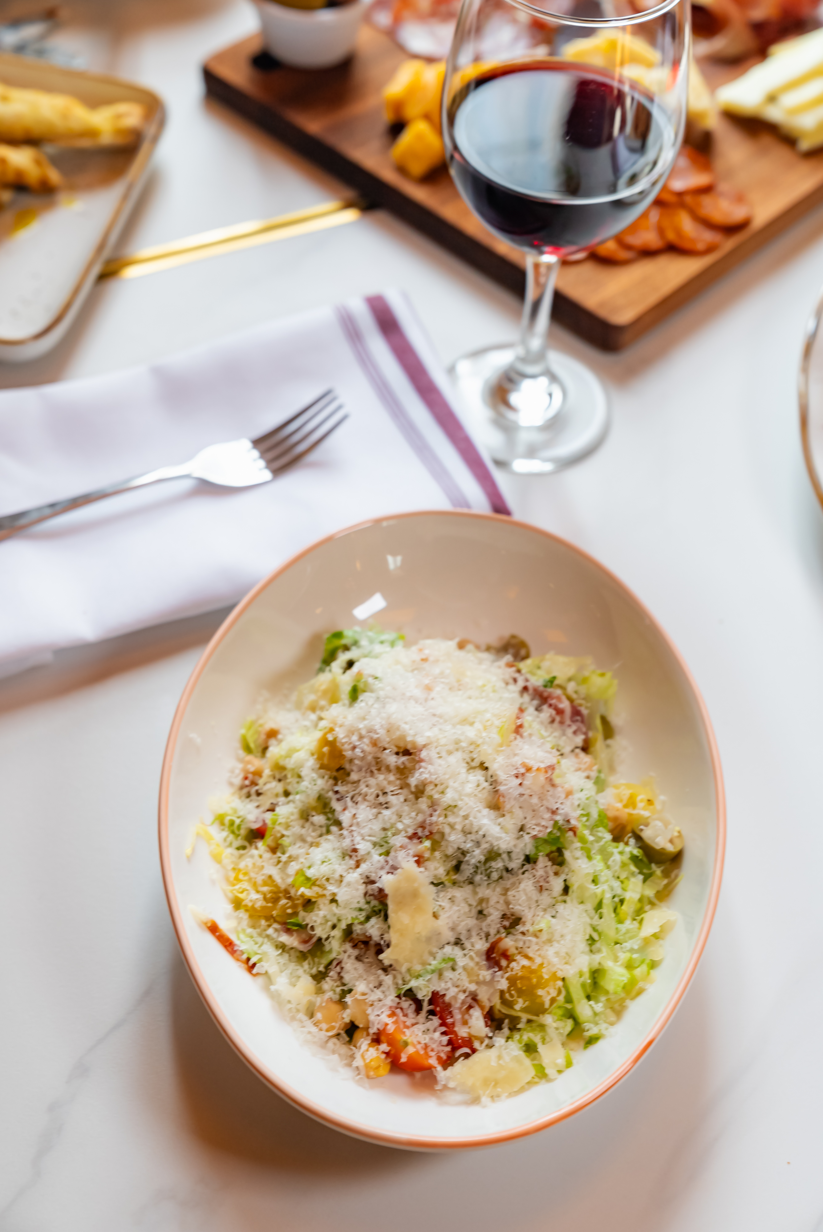 a bowl of food on a plate on a table