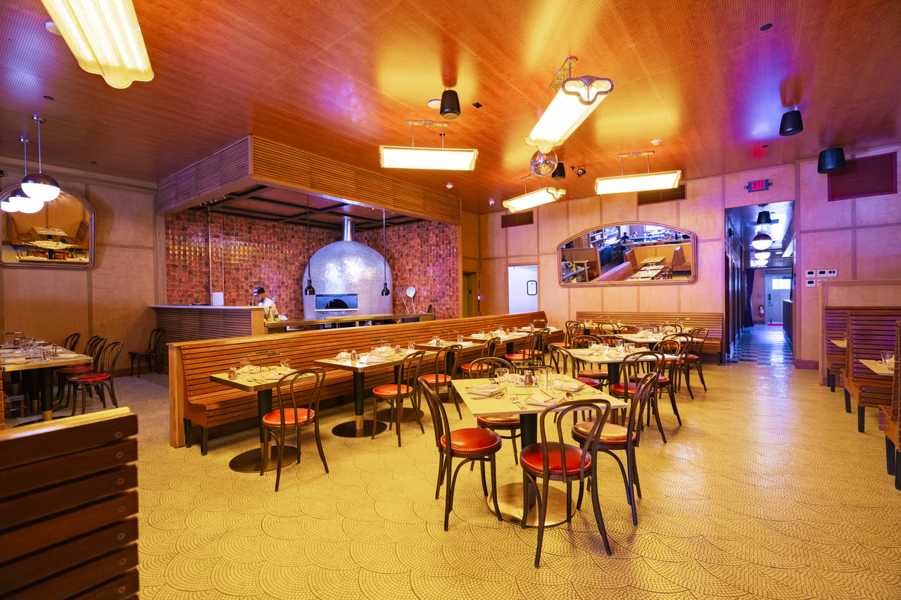 a room with tables and chairs