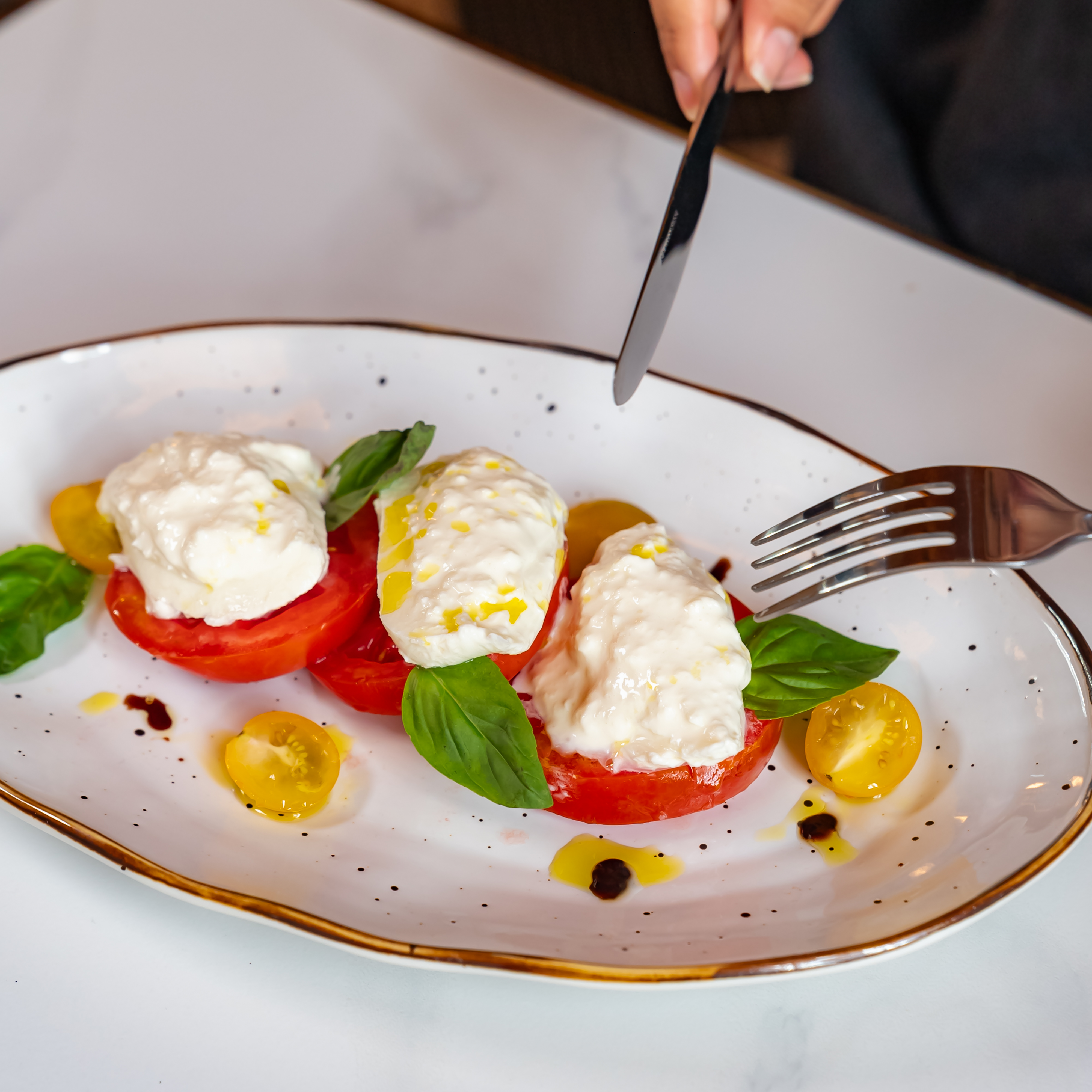 a plate of food with a fork and knife