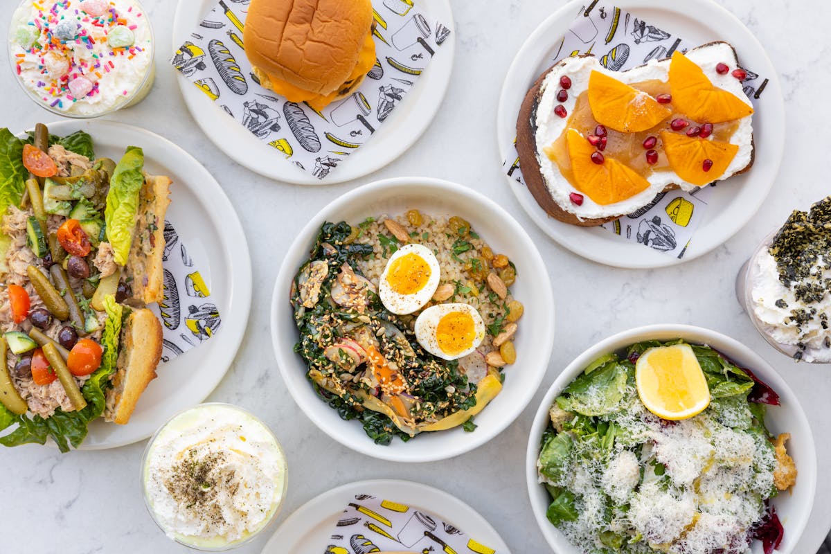 a bowl filled with different types of food on a plate