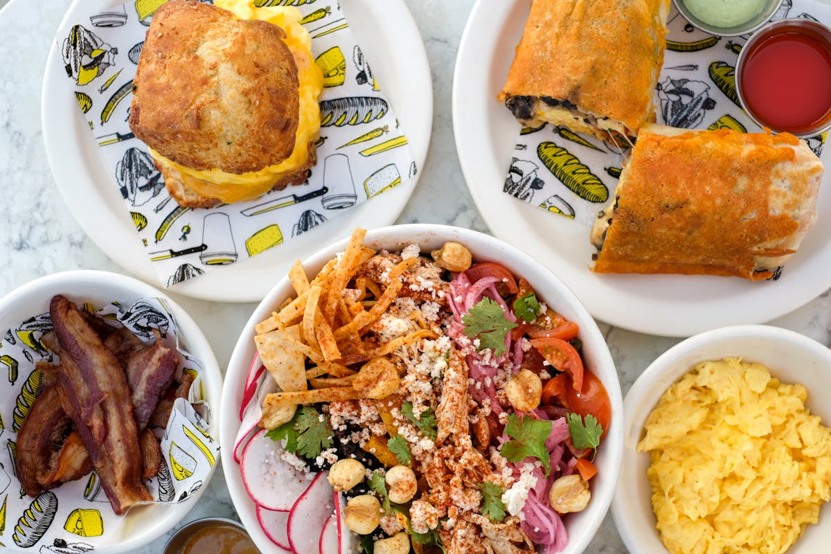 a bowl filled with different types of food on a plate