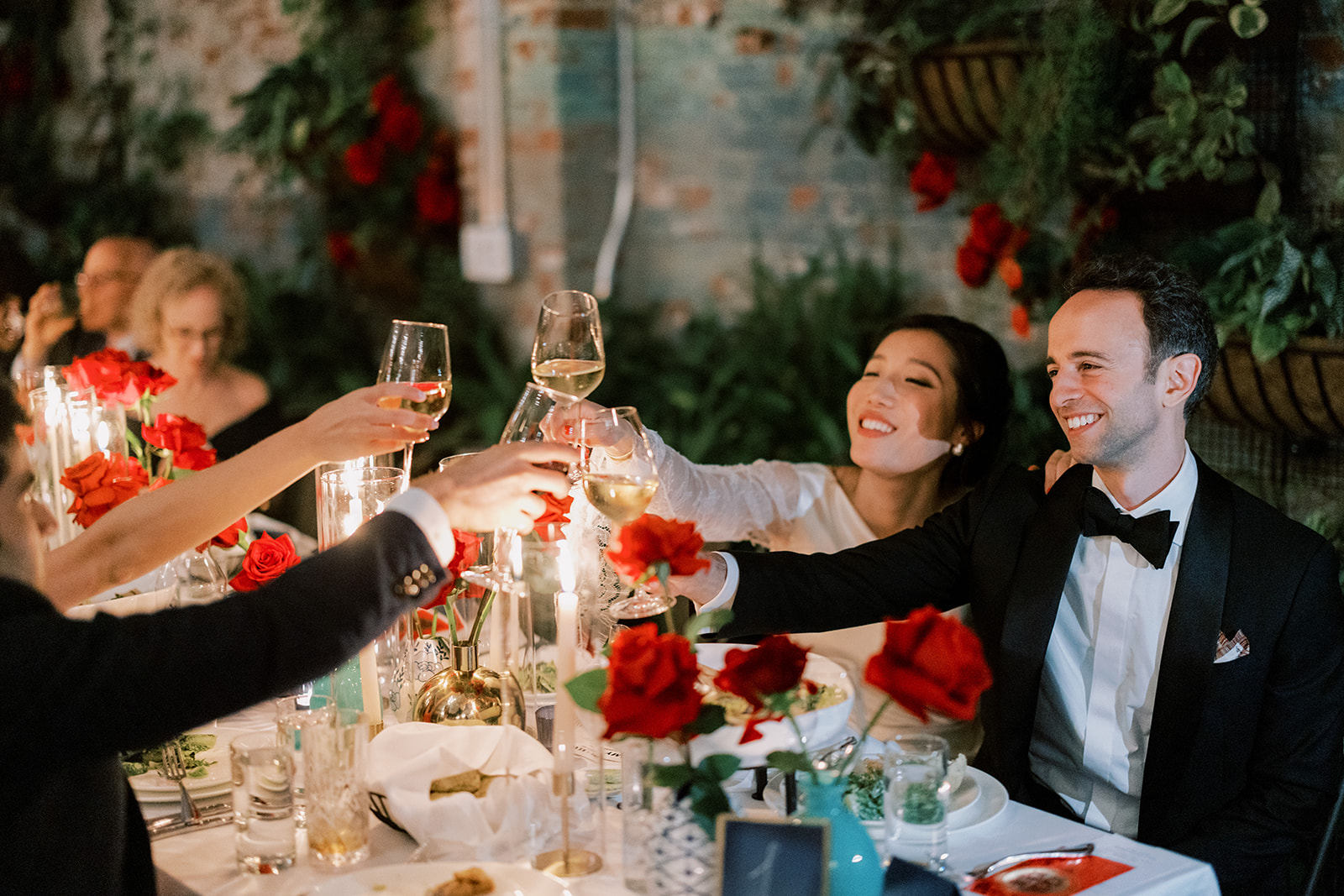 The head table at a Brooklyn Winery weddings shares a toast!