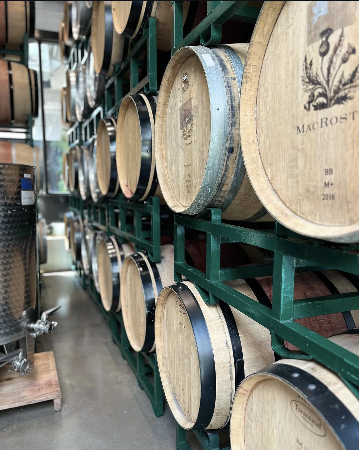 a close up of wine barrels at brooklyn winery