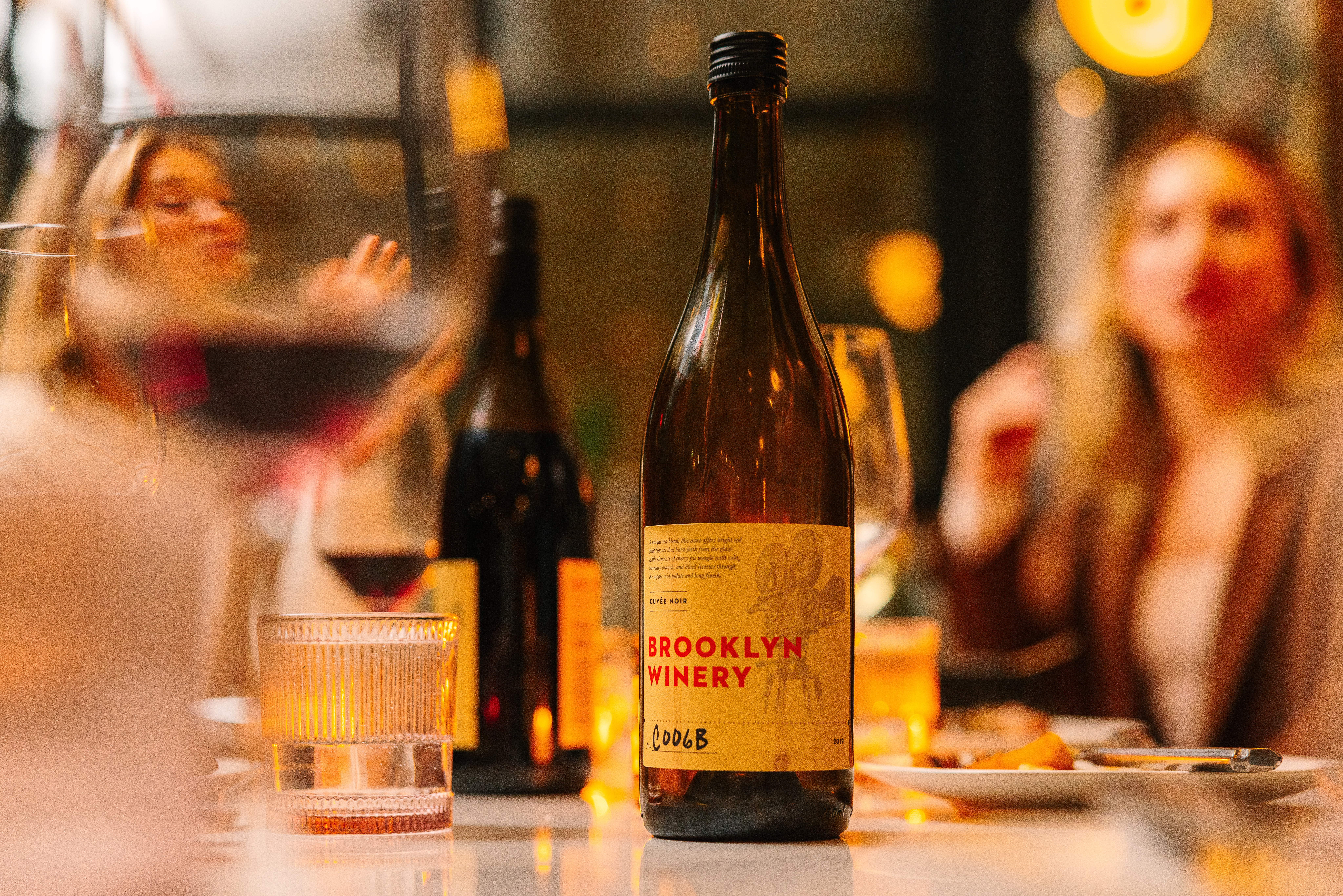 a close up of a bottle of wine on a table