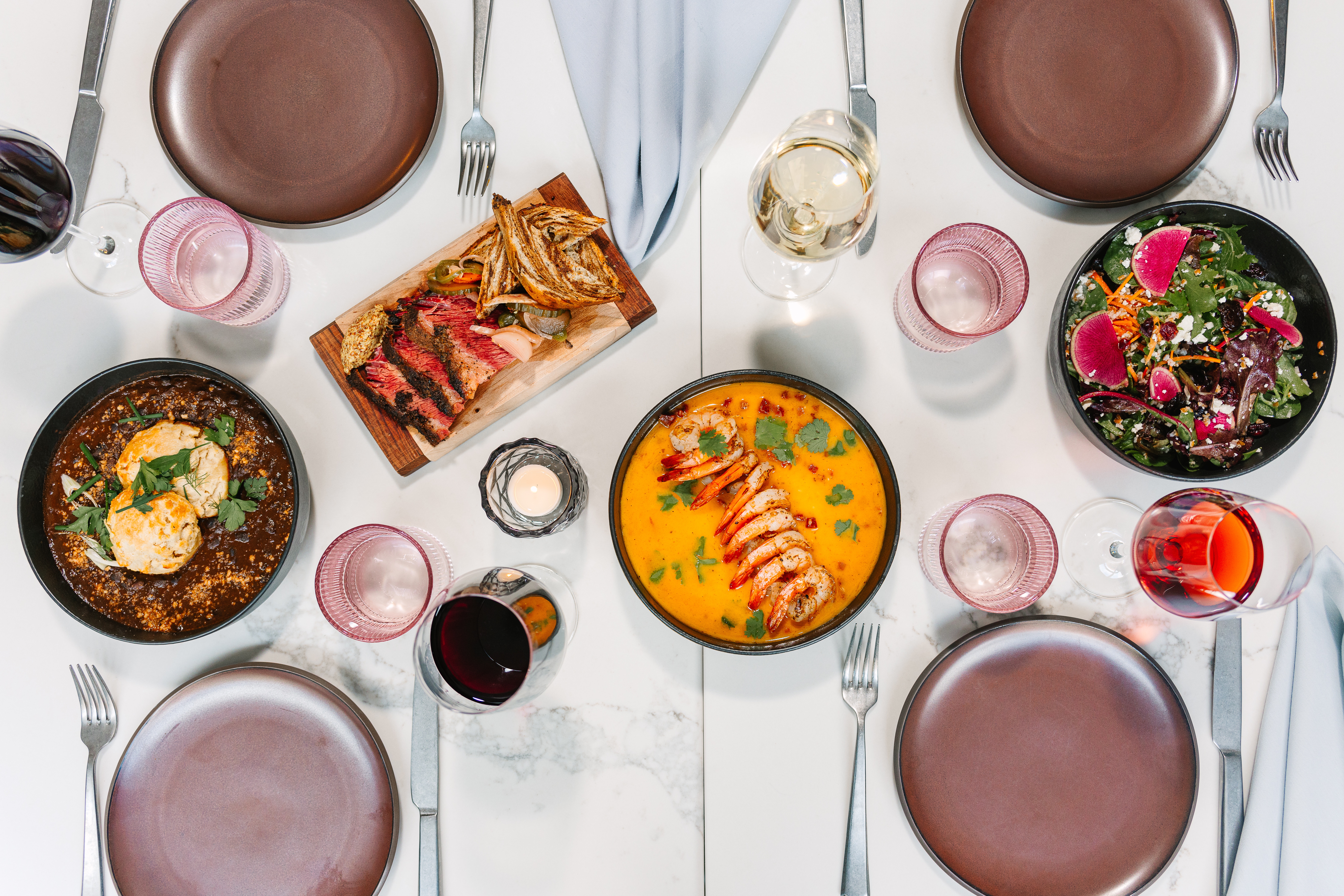 a table topped with plates of food on a plate