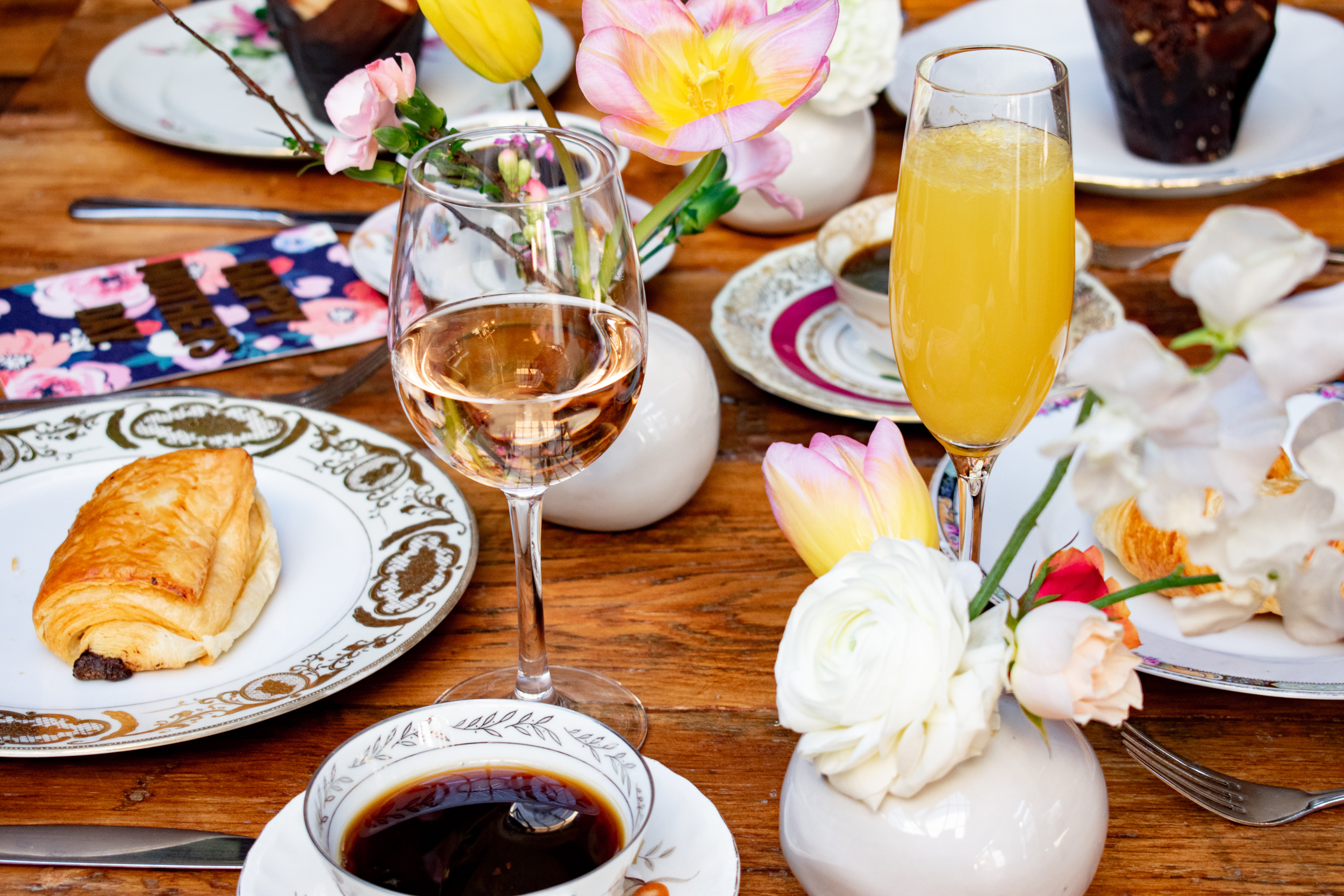 a mother's day brunch spread with coffee and mimosas