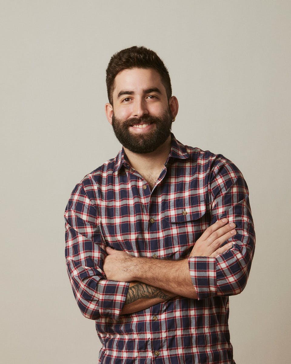 a man holding a wii remote in his hand