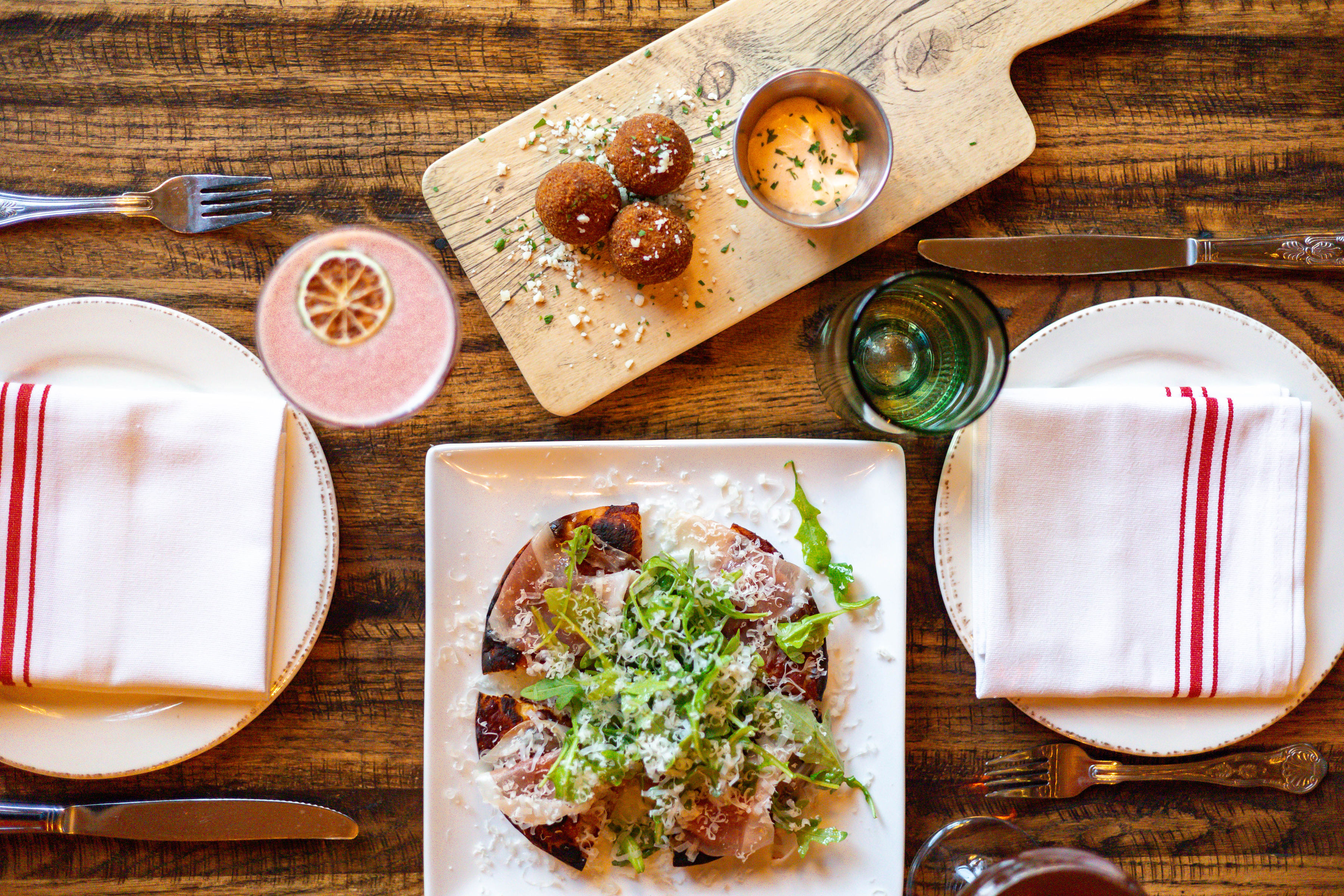 a plate of food on a wooden table
