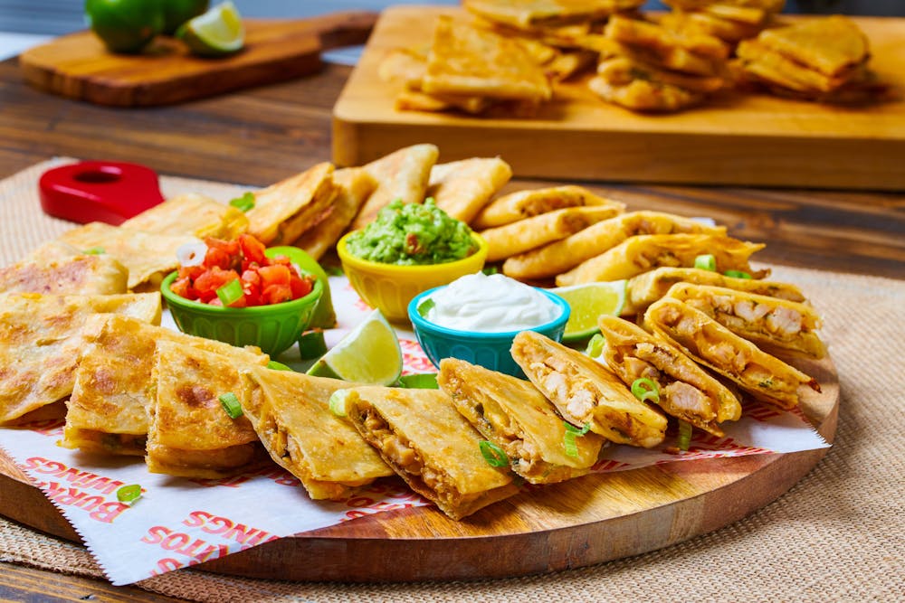 a bunch of different types of food on a table