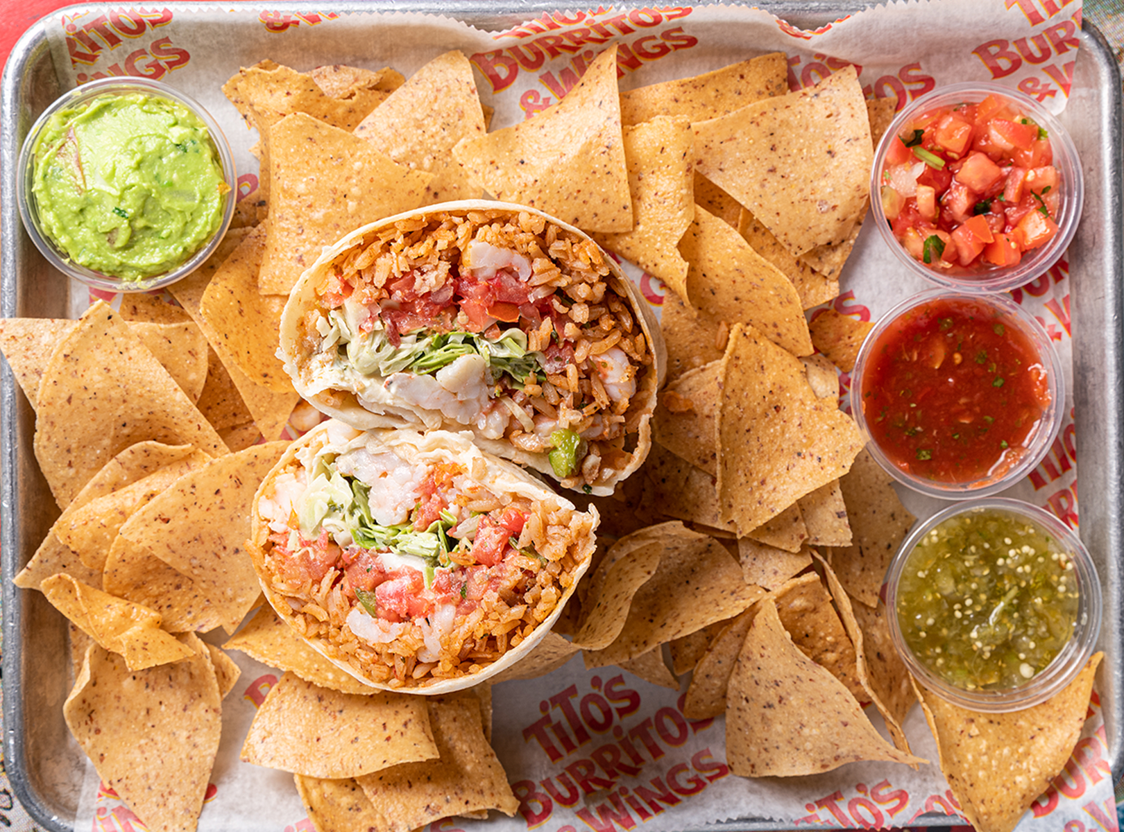 a box filled with different types of food on a table
