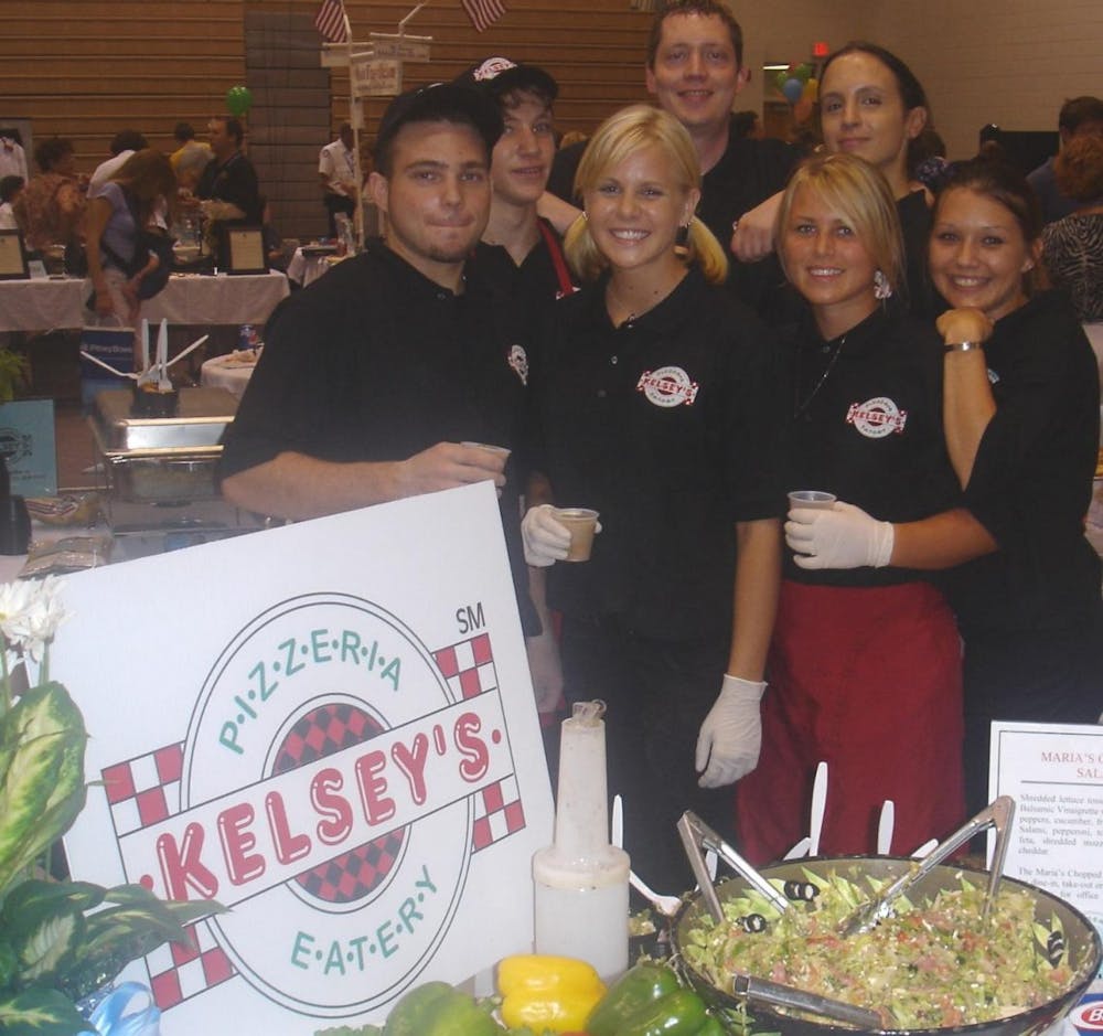 a group of people posing for a photo