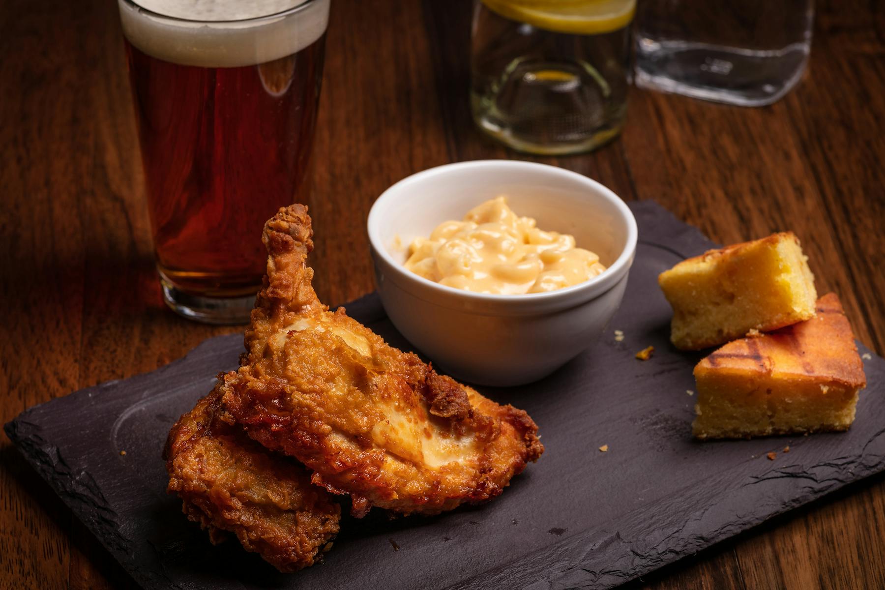 a plate of food sitting on top of a wooden table