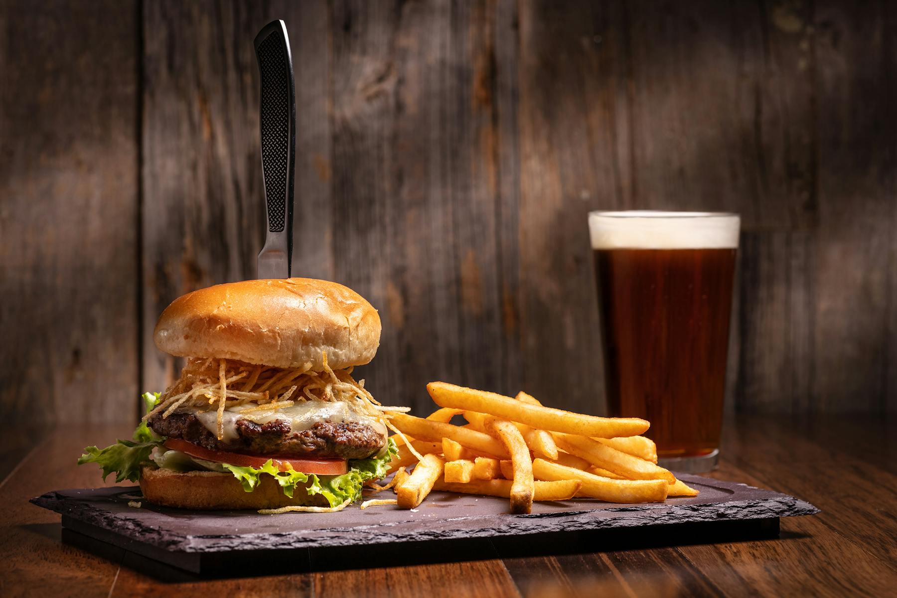 a sandwich sitting on top of a wooden table