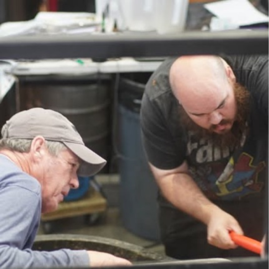 Pete Goldman and Aaron working together during a brew day at Upper Depot Brewing.