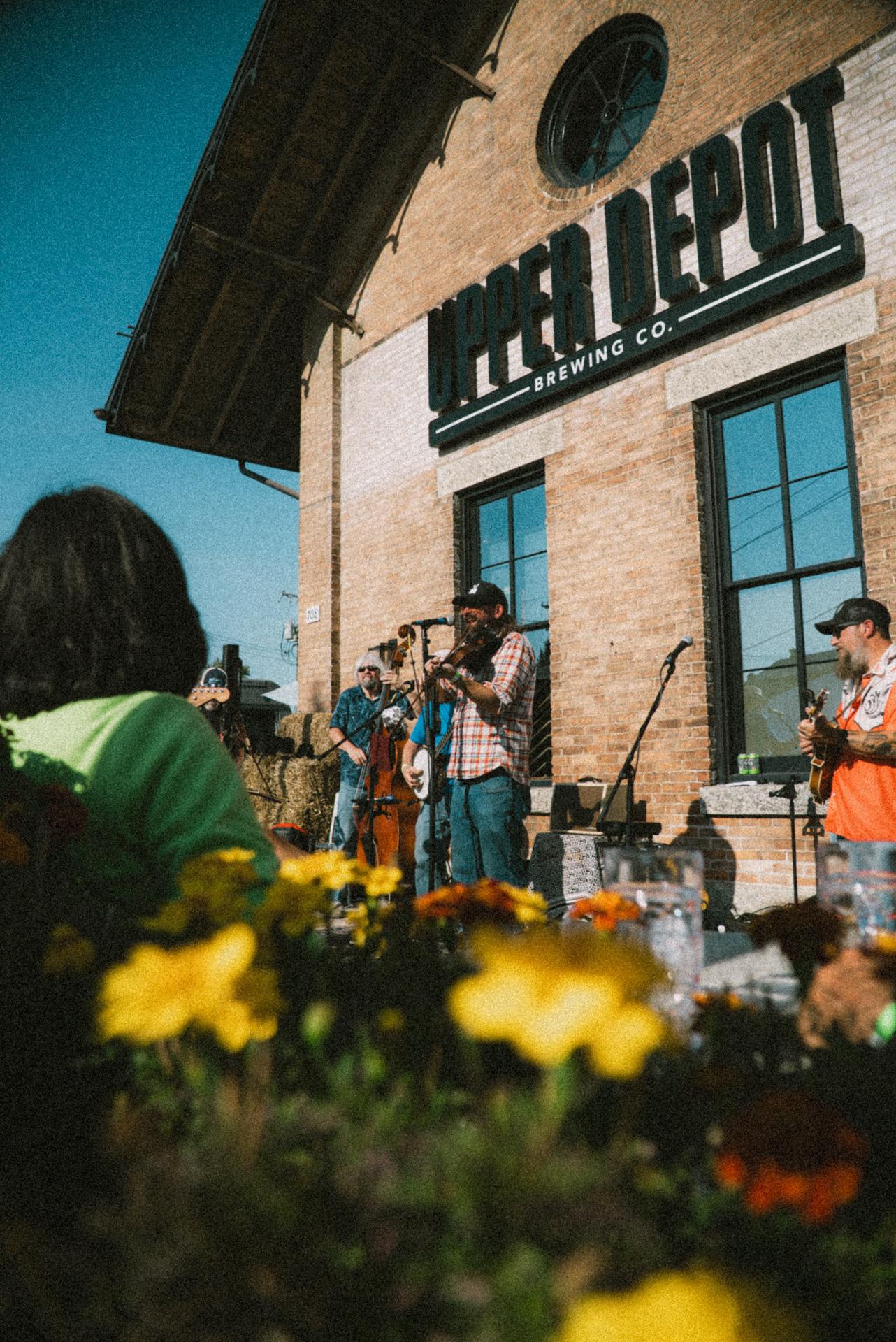 Hudson Oktoberfest event and performers at Upper Depot Brewing Co. in Hudson, New York.