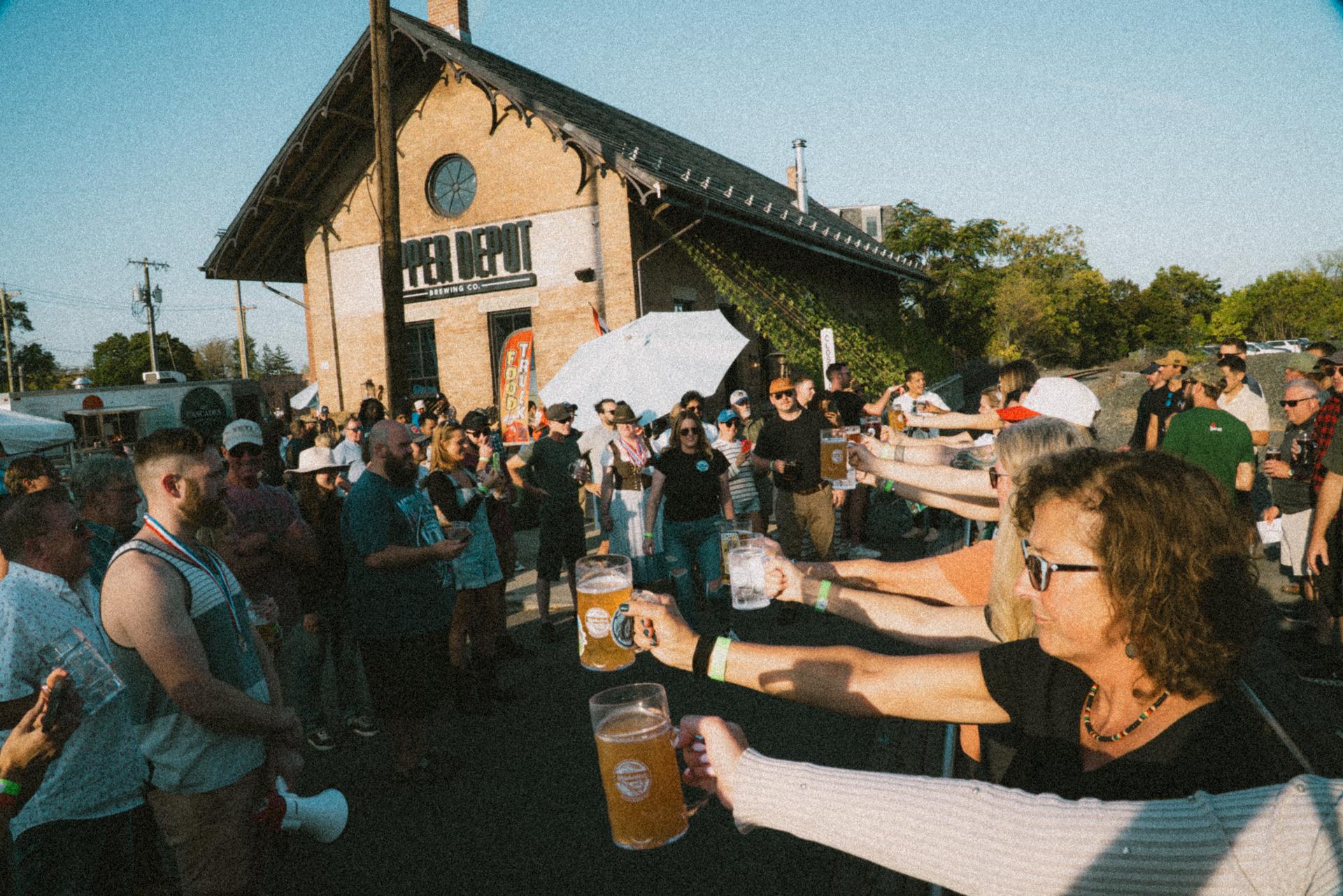 Hudson Oktoberfest event and performers at Upper Depot Brewing Co. in Hudson, New York.