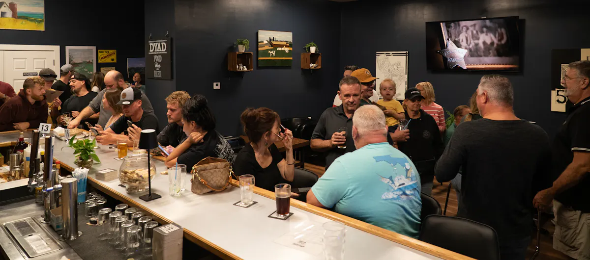 a group of people sitting at a table