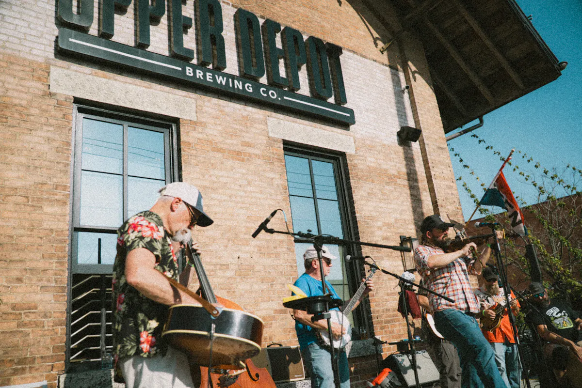 Hudson Oktoberfest event and performers at Upper Depot Brewing Co. in Hudson, New York.