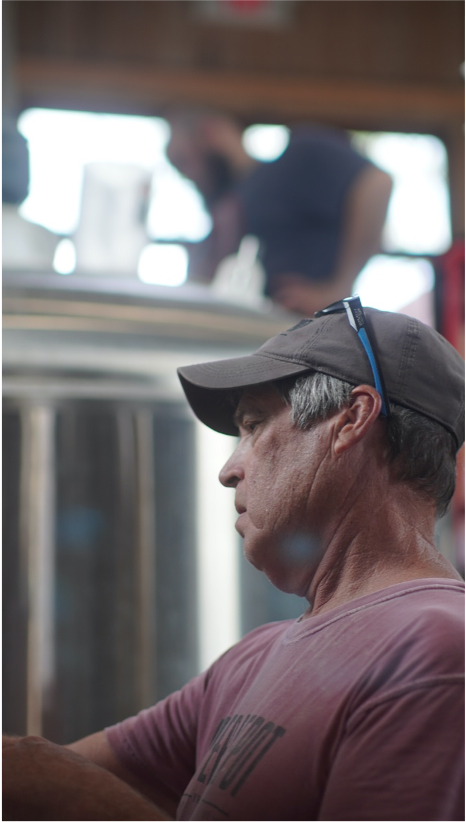 Pete Goldman working during a brew day at Upper Depot Brewing.