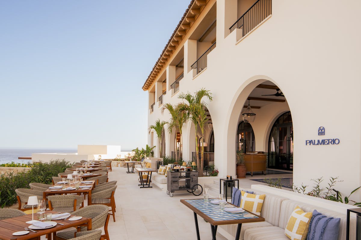 a dining room table in front of a building
