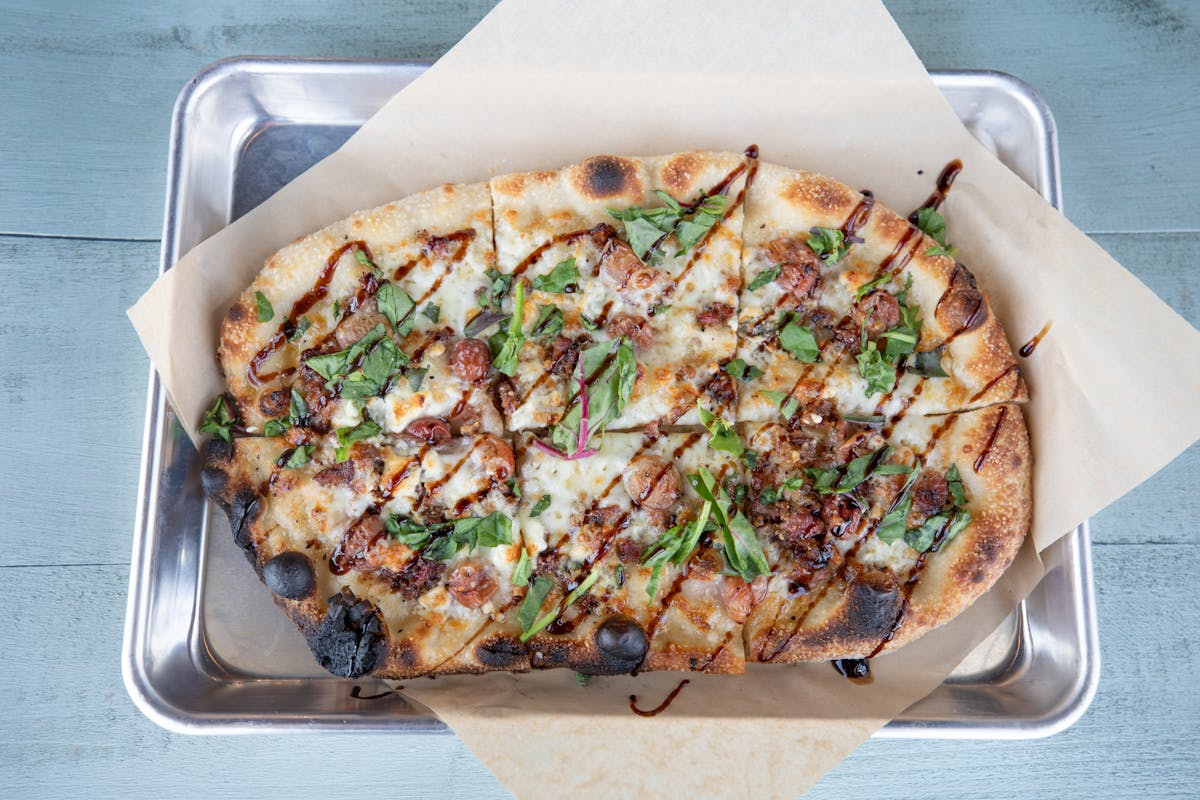 a slice of pizza on a tray