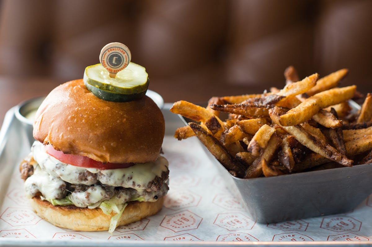 a sandwich and fries on a plate