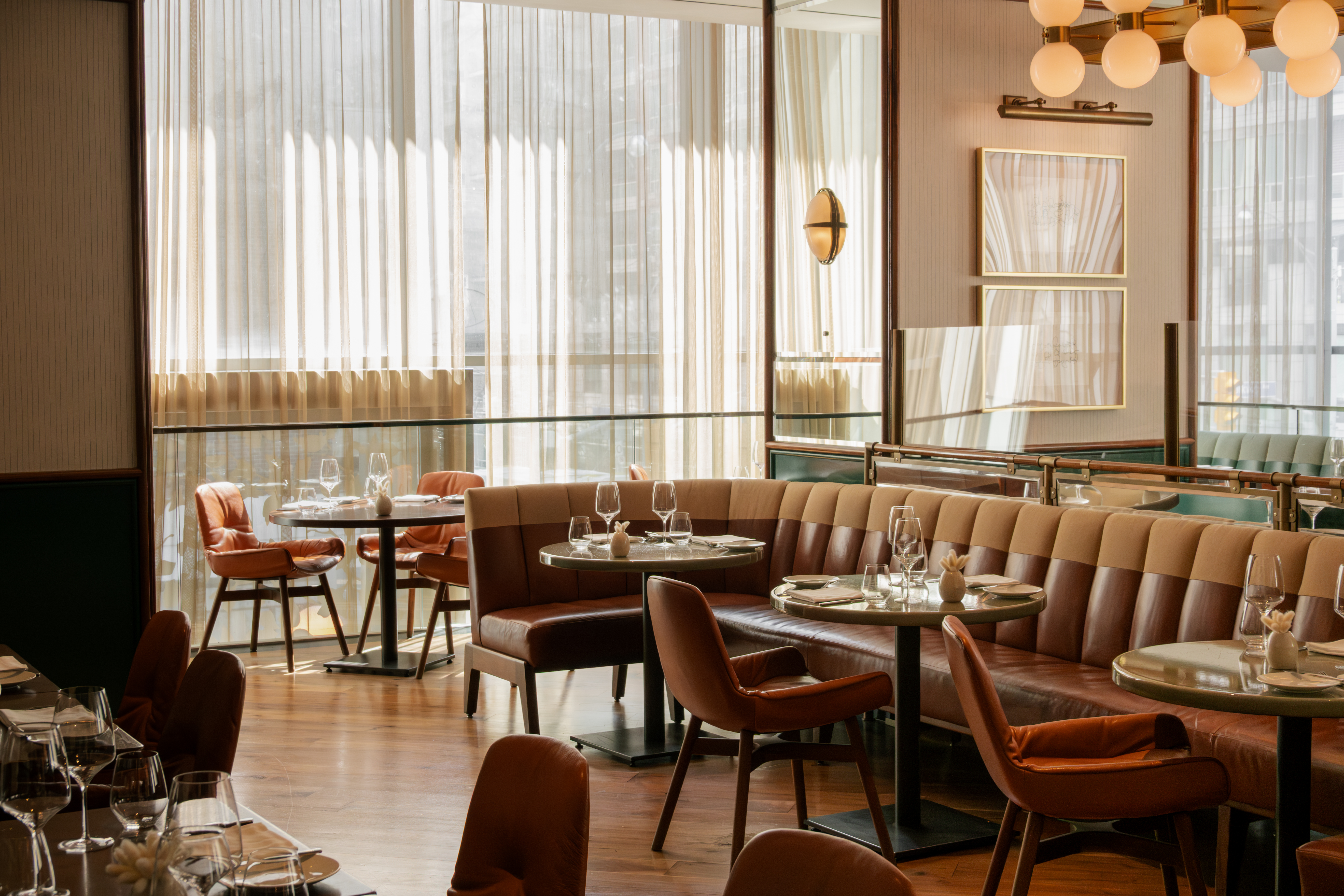 a restaurant with tables and chairs