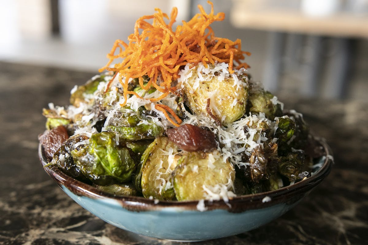 a close up of a plate of food with broccoli