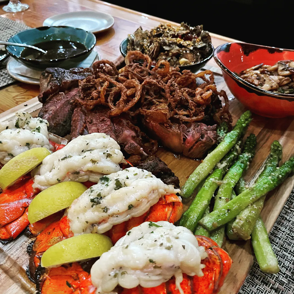 a plate of food with meat and vegetables