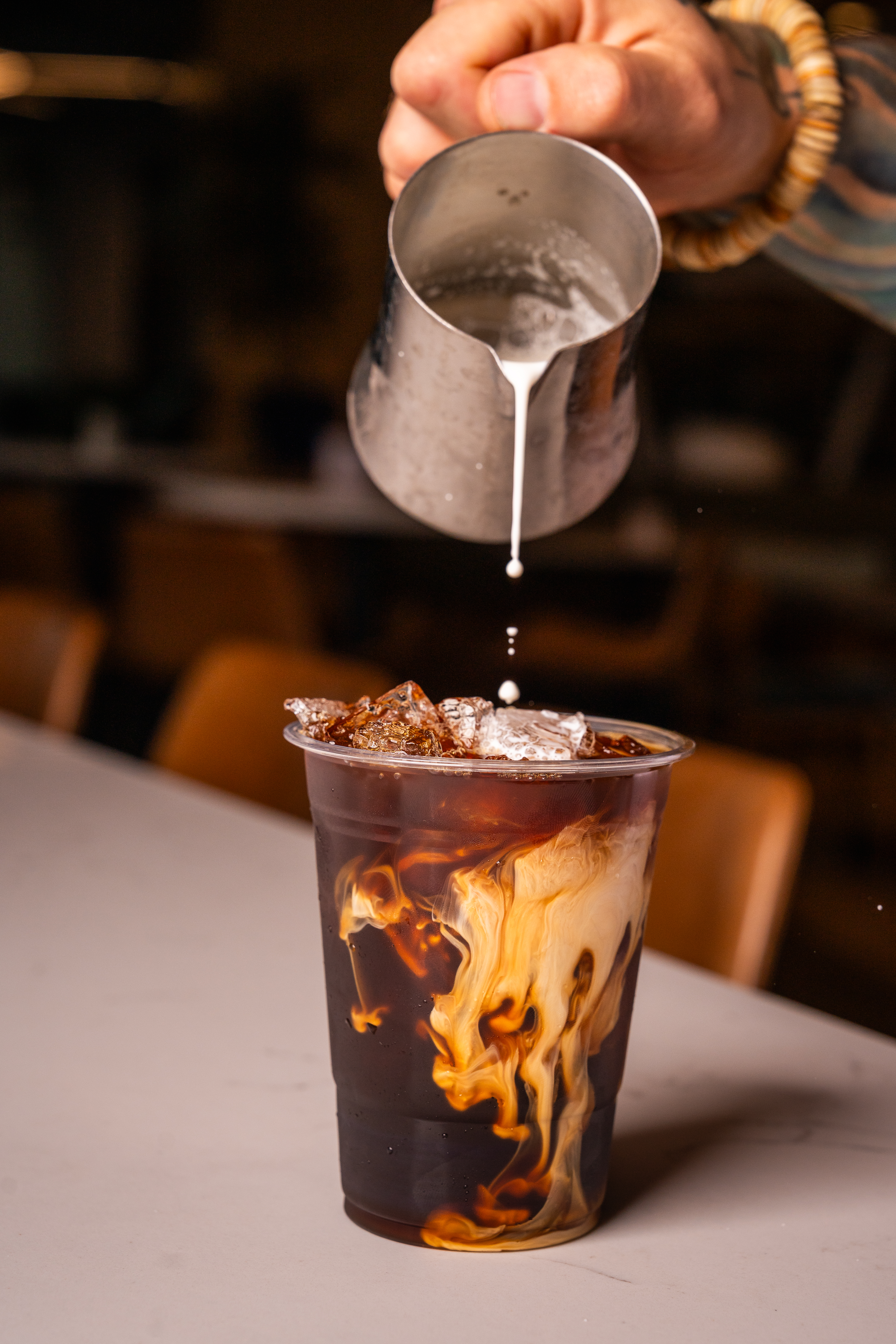 a glass cup on a table