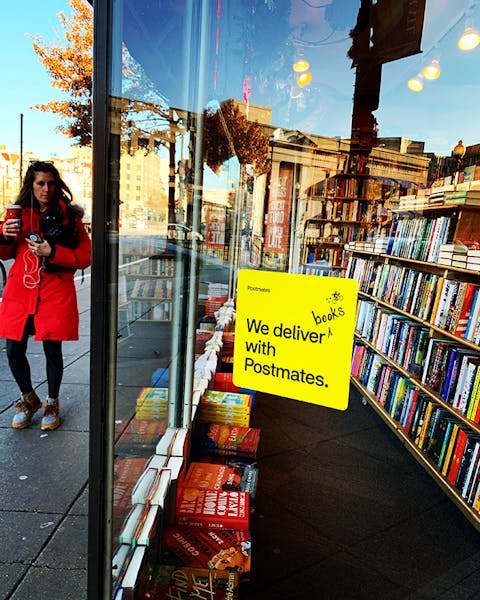 a person standing in front of a store