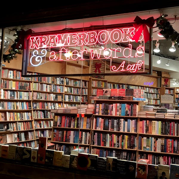a close up of a book shelf filled with books