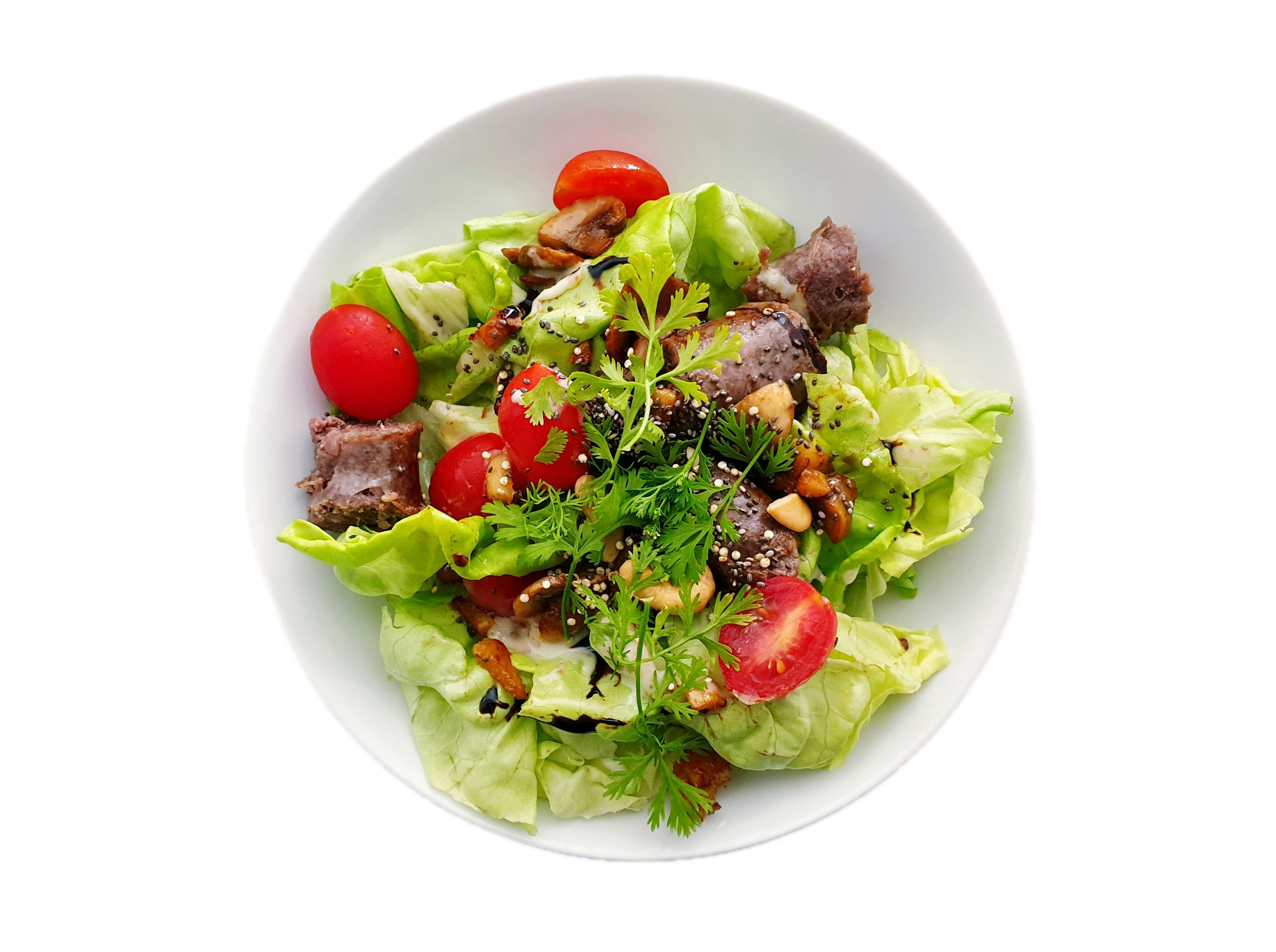 a bowl of salad on a plate