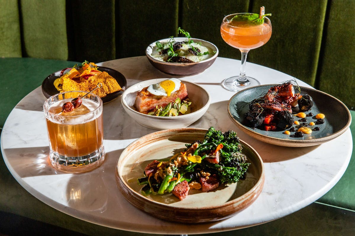 a plate full of food sitting on a table