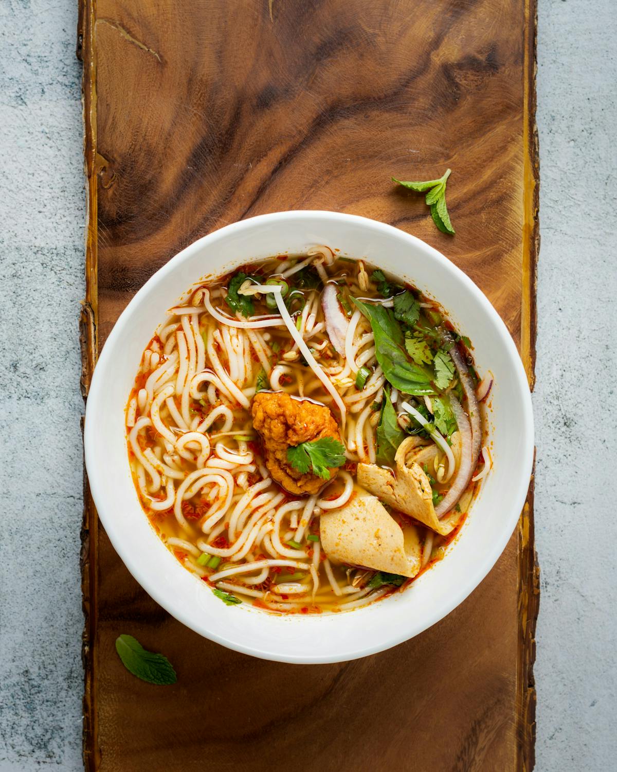a bowl of food sitting on a table