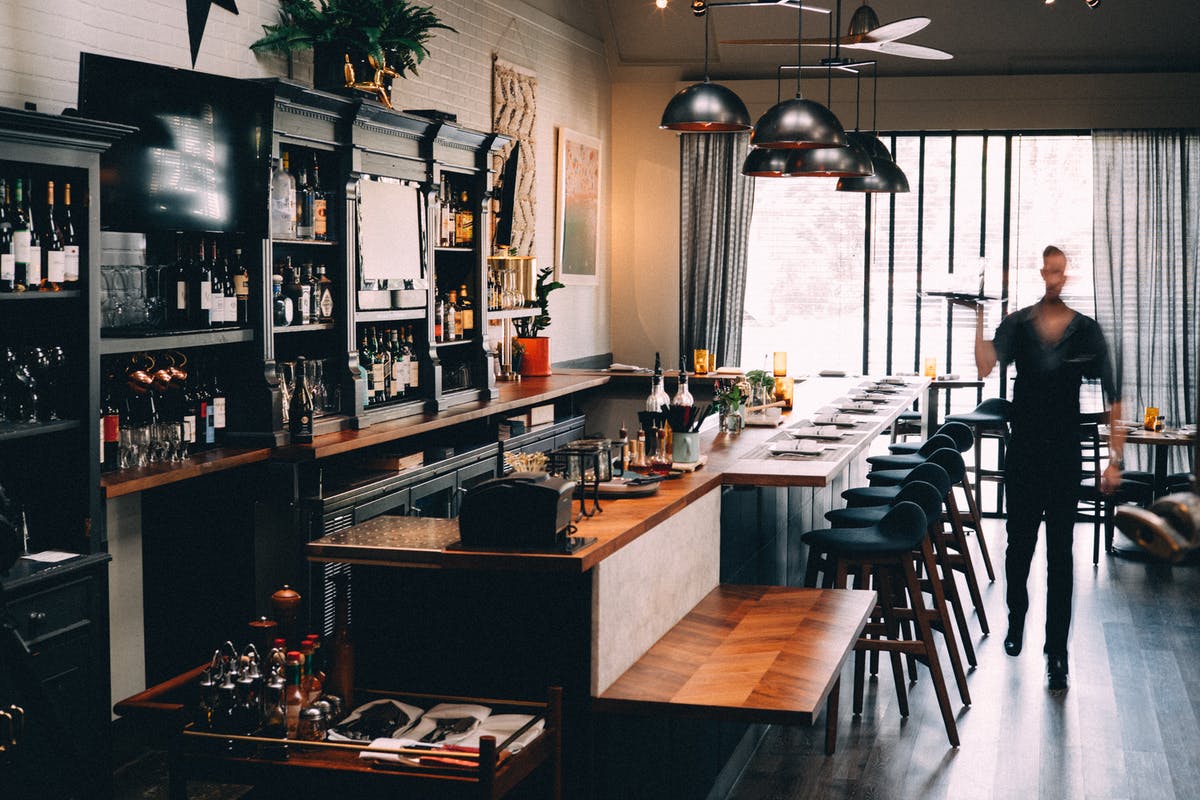 a kitchen with a dining room table