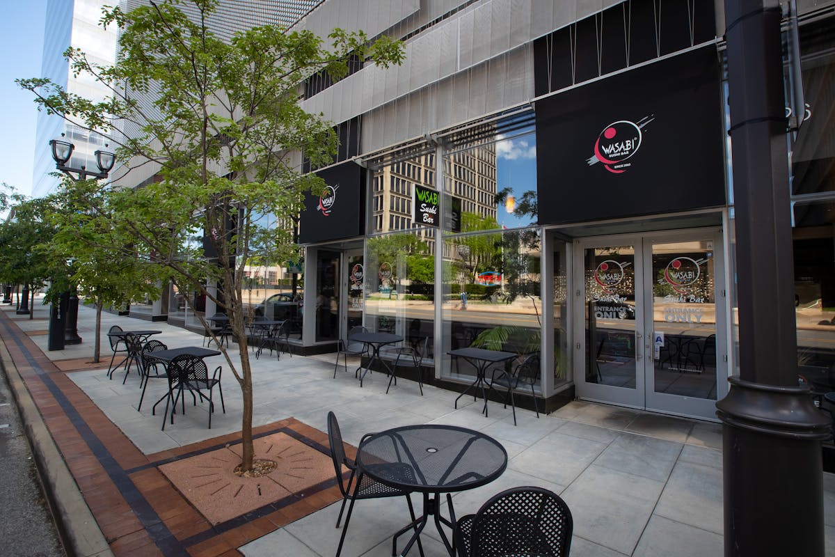 a bicycle parked on the side of a building
