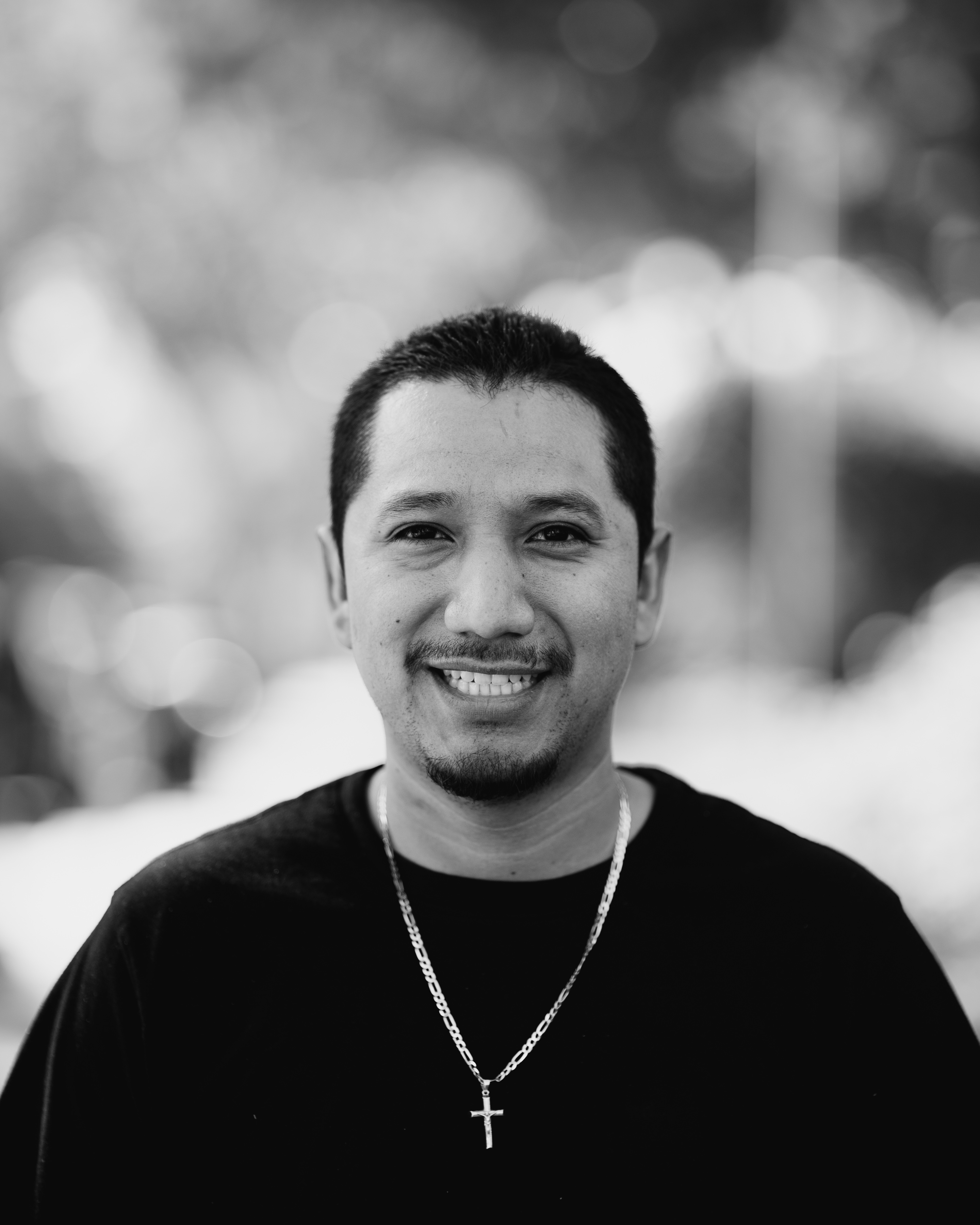 a man smiling for a picture