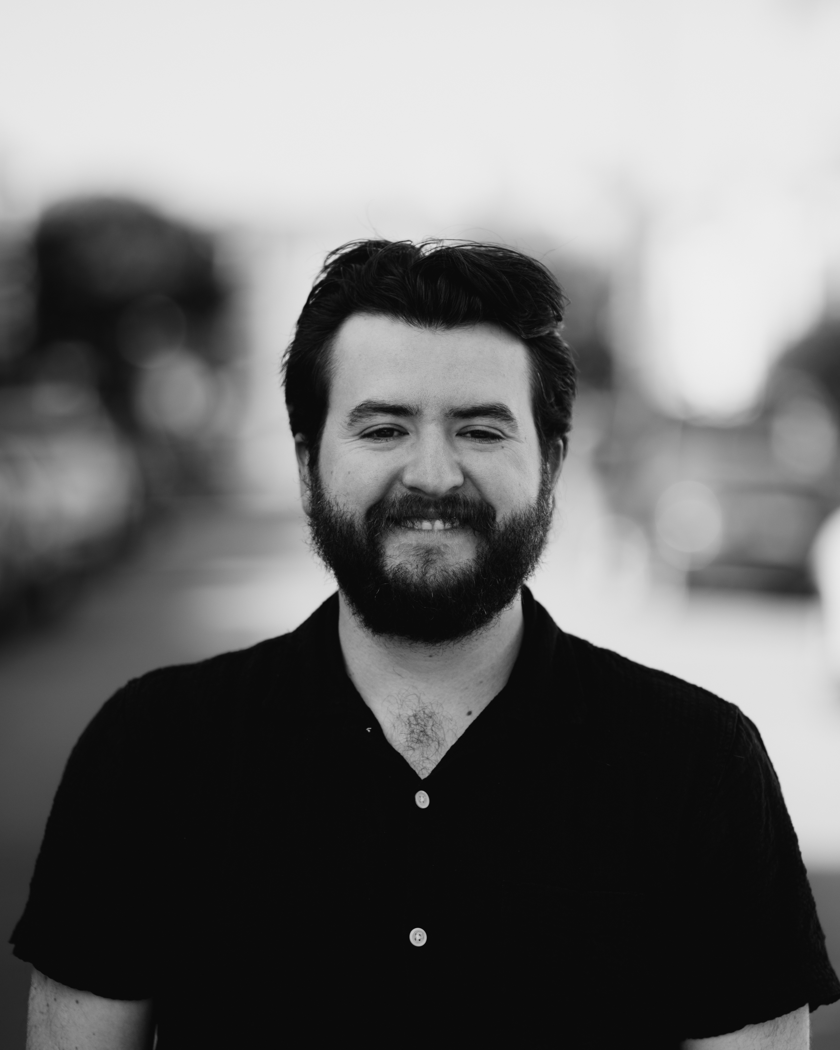 a man smiling for a picture