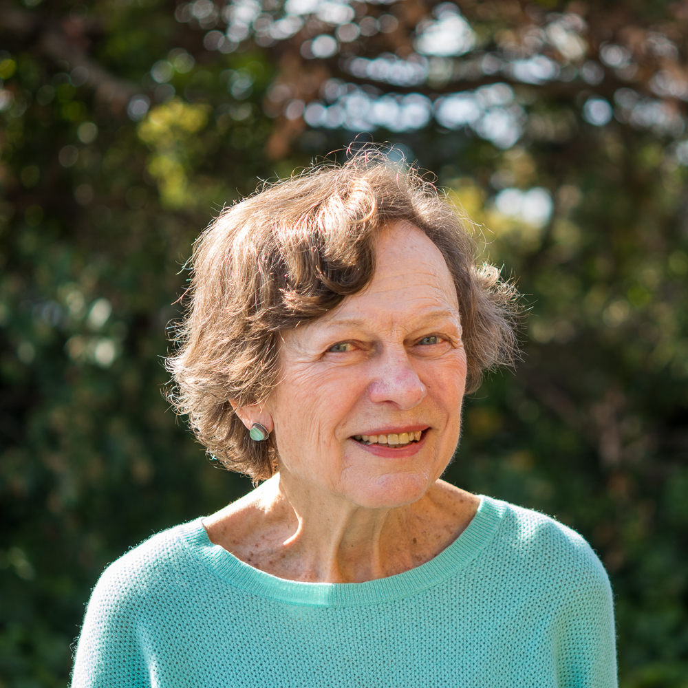 a woman smiling for the camera