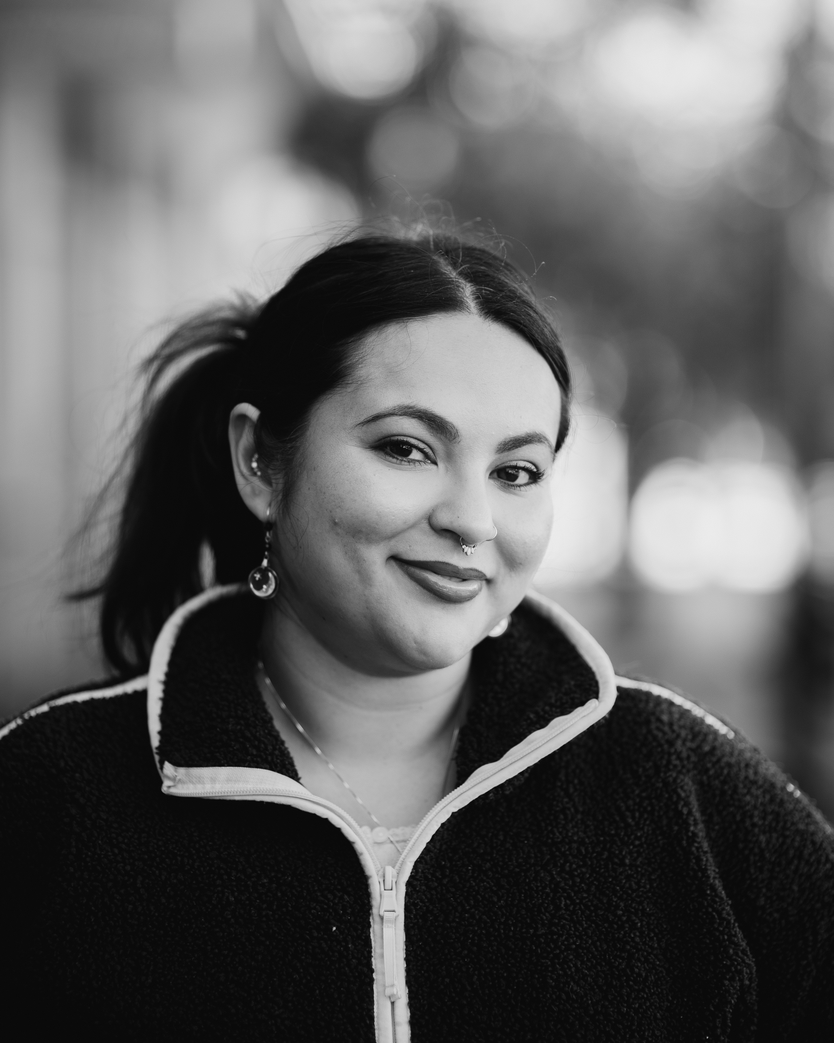 a woman with a nose ring