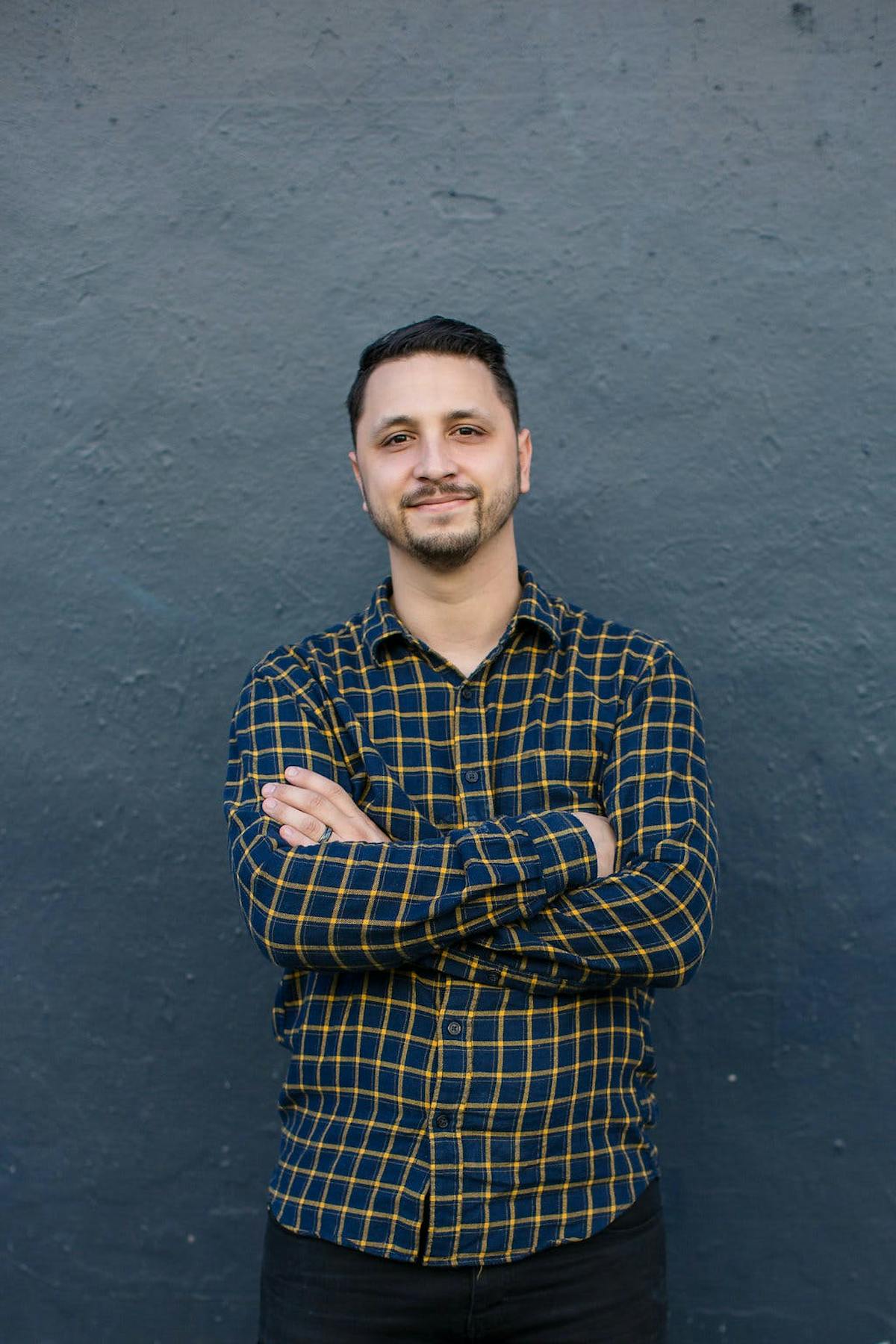 a man wearing a green shirt