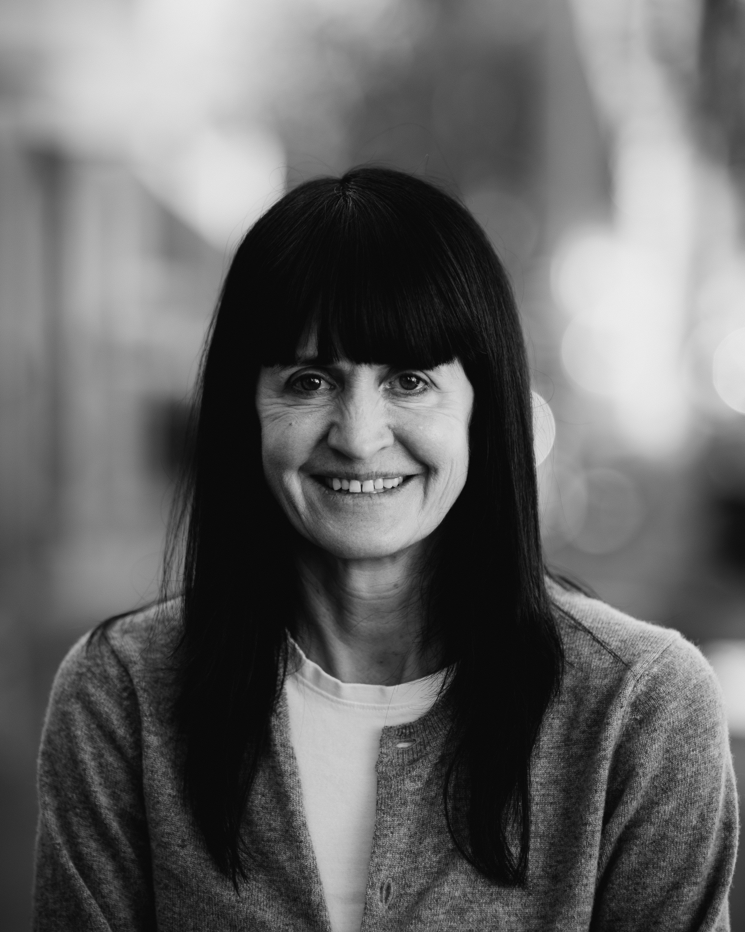 a woman smiling at the camera