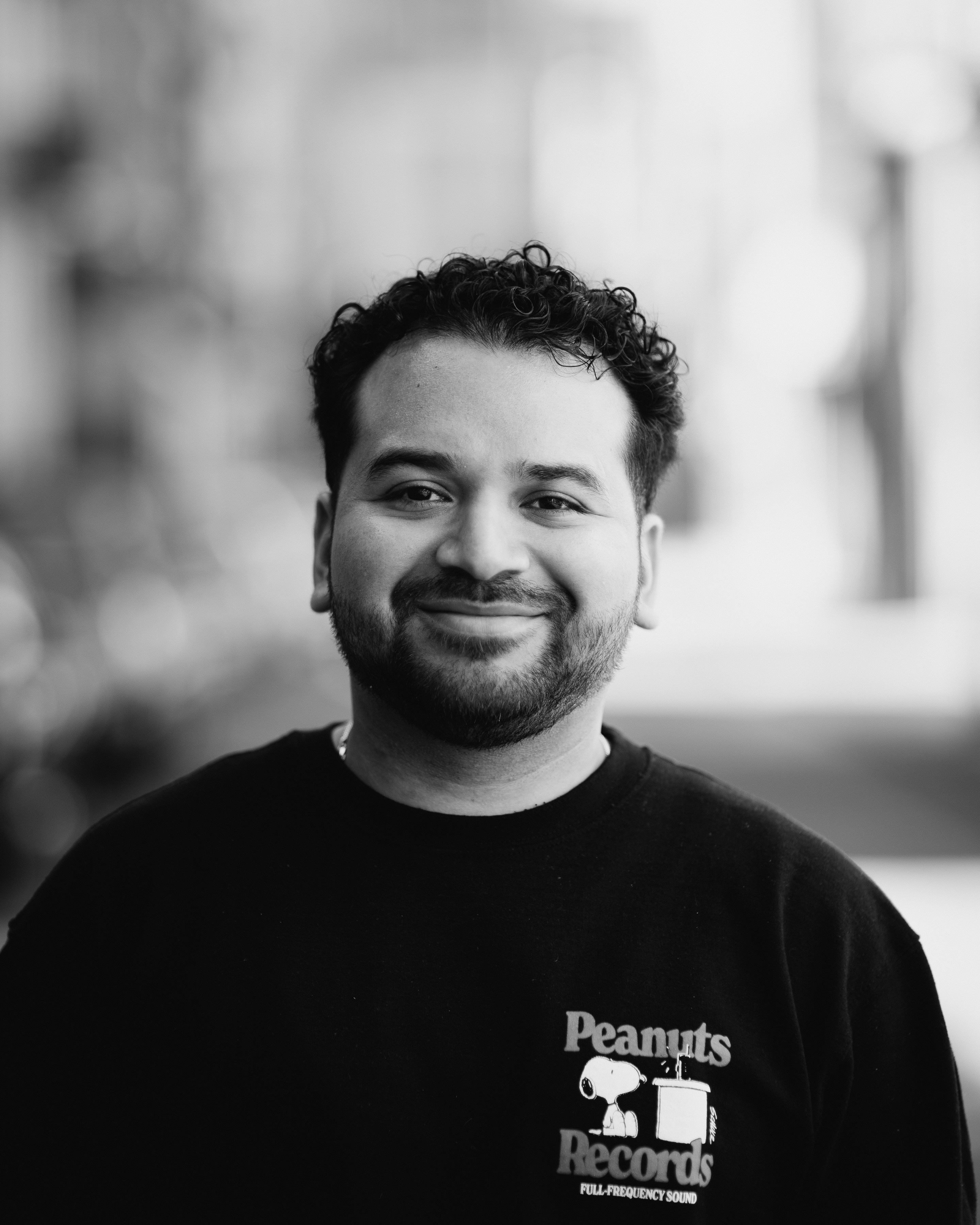 a man smiling for a picture