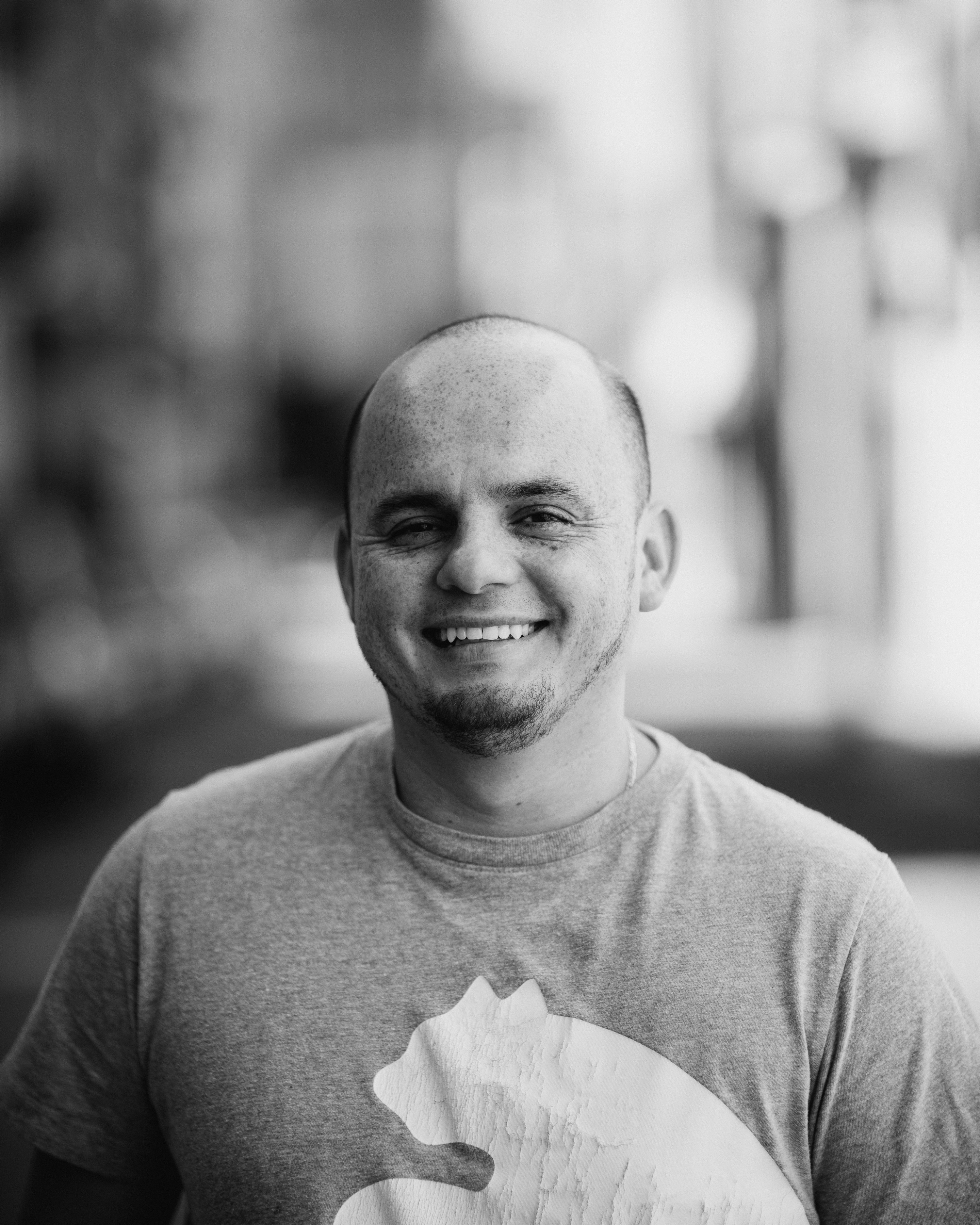 a man smiling for a picture