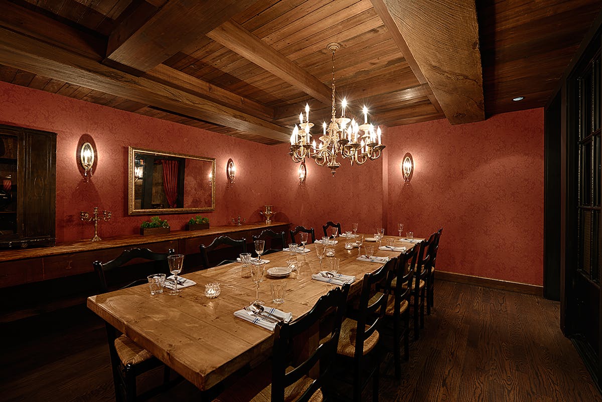 a kitchen with an island in the middle of a room