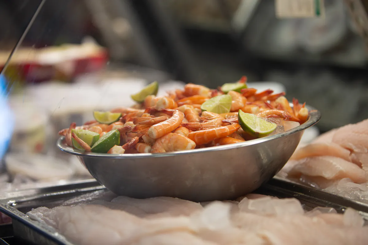 a bowl filled with grilled shrimps