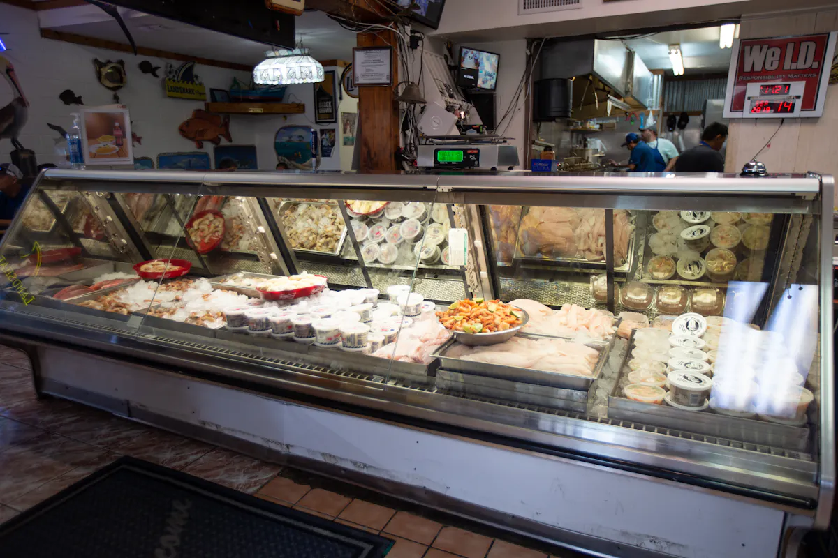 a counter showcasing seafood for sale