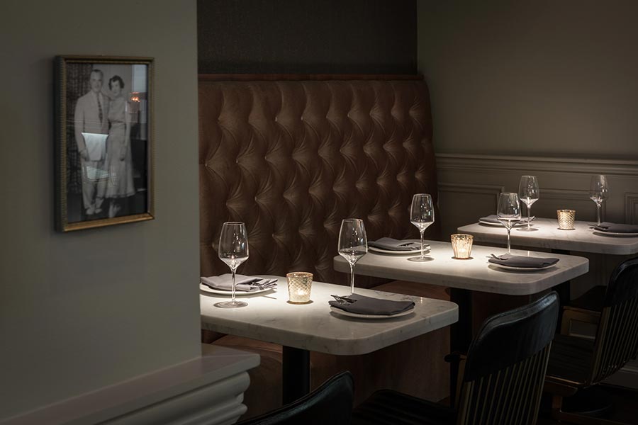 a desk with a sink and a mirror